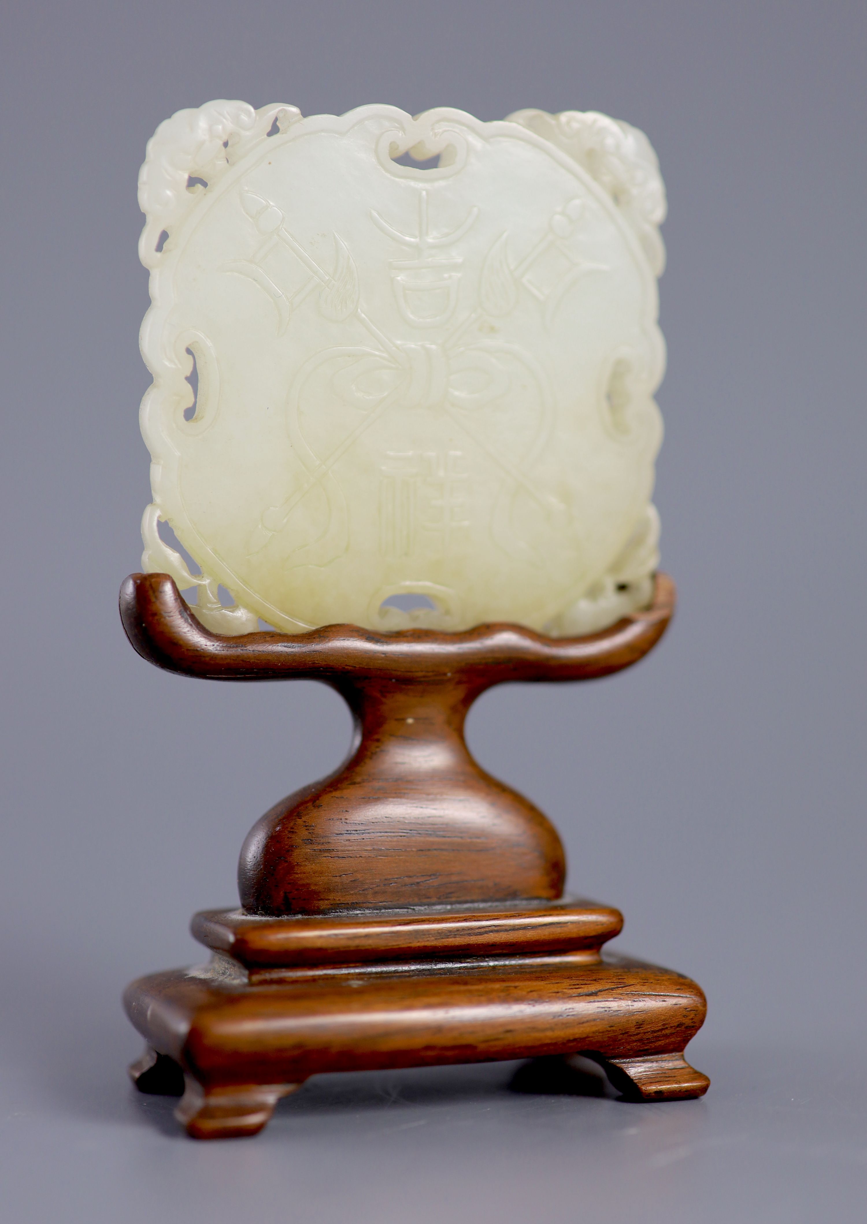A Chinese pale celadon jade plaque, 19th century,